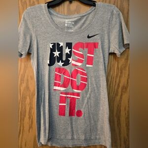 Cute gray, red, white and blue, short sleeve Nike shirt. Great shape. Size small